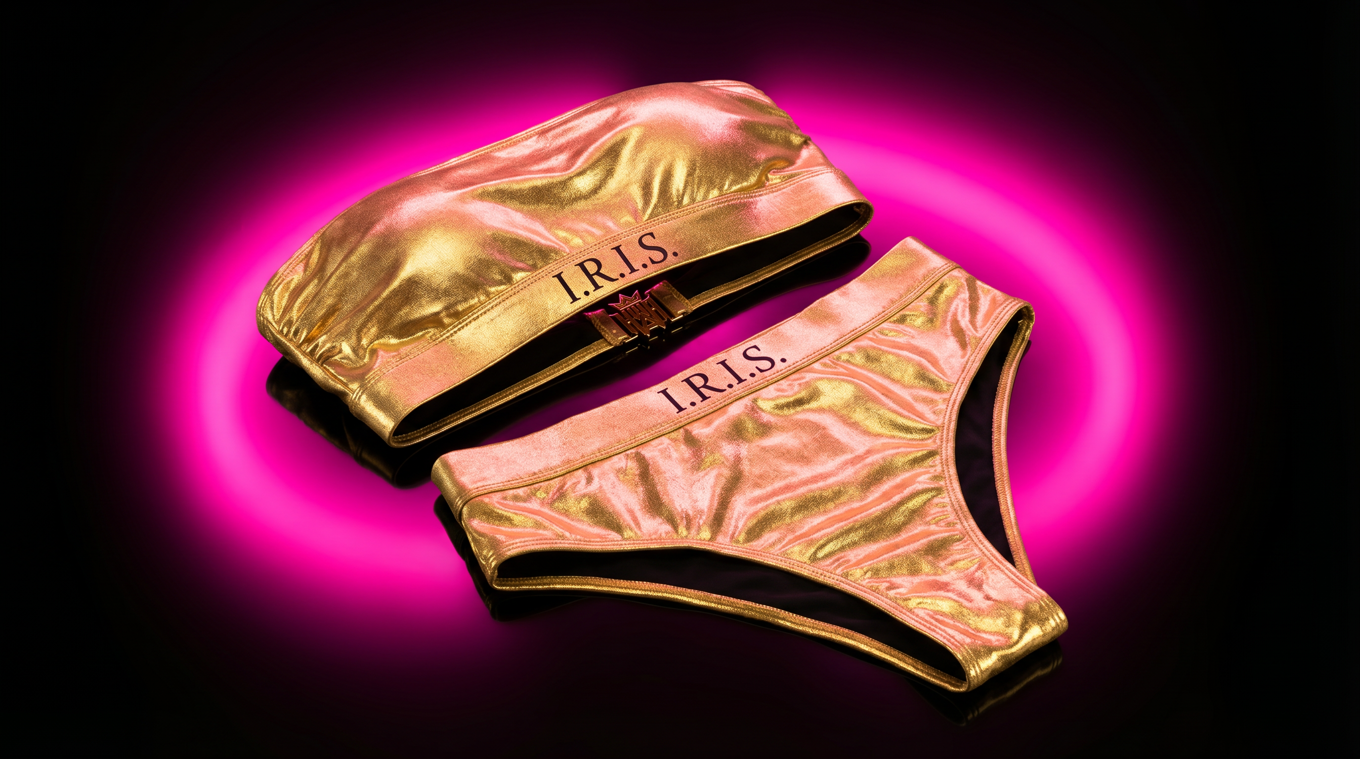 Gold I.R.I.S. products on a black background with pink glow